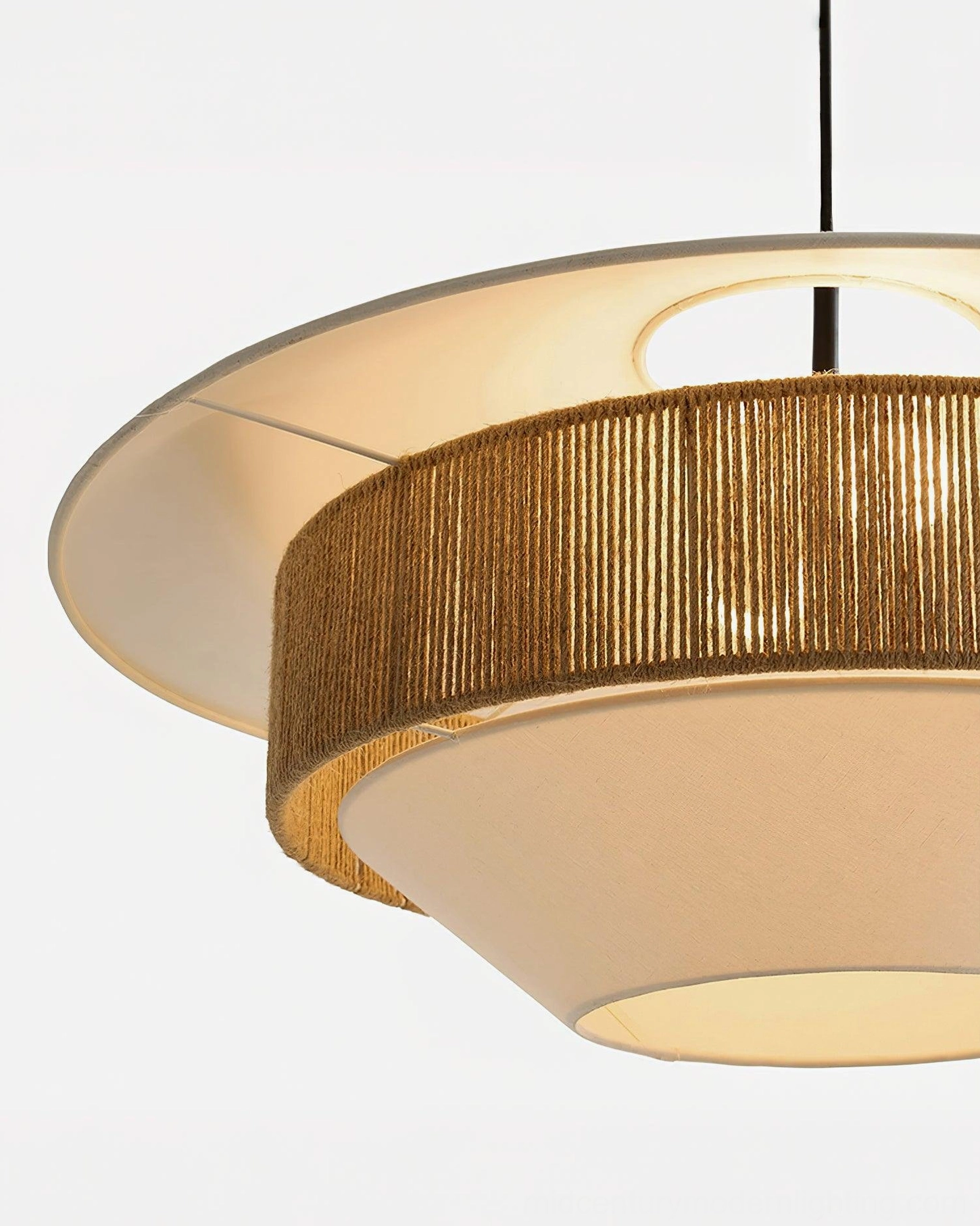 Mixed woven pendant light installation showing suspension wire and height proportion