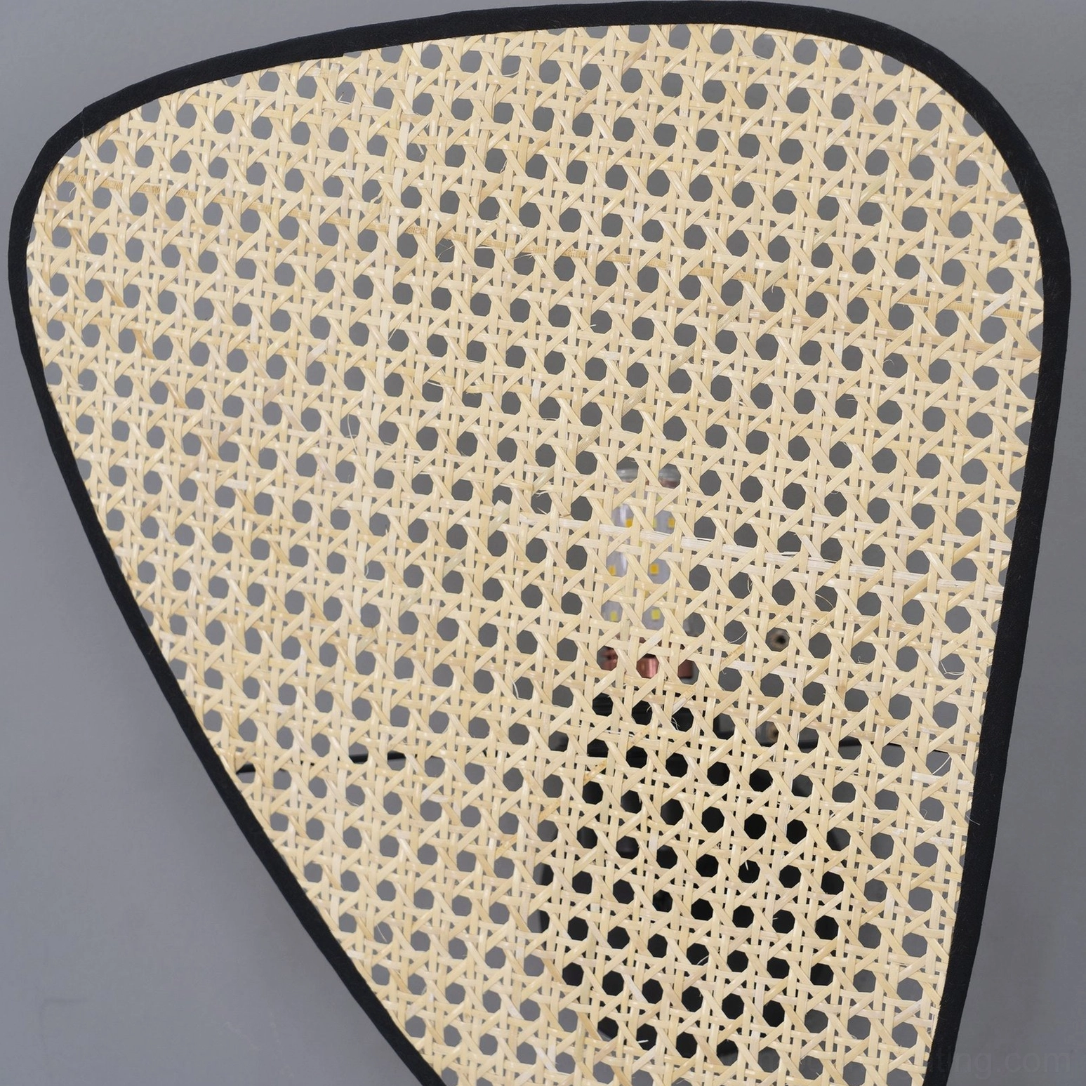 Woven rattan wall lamp artistic shadow play natural bamboo texture warm light diffusion