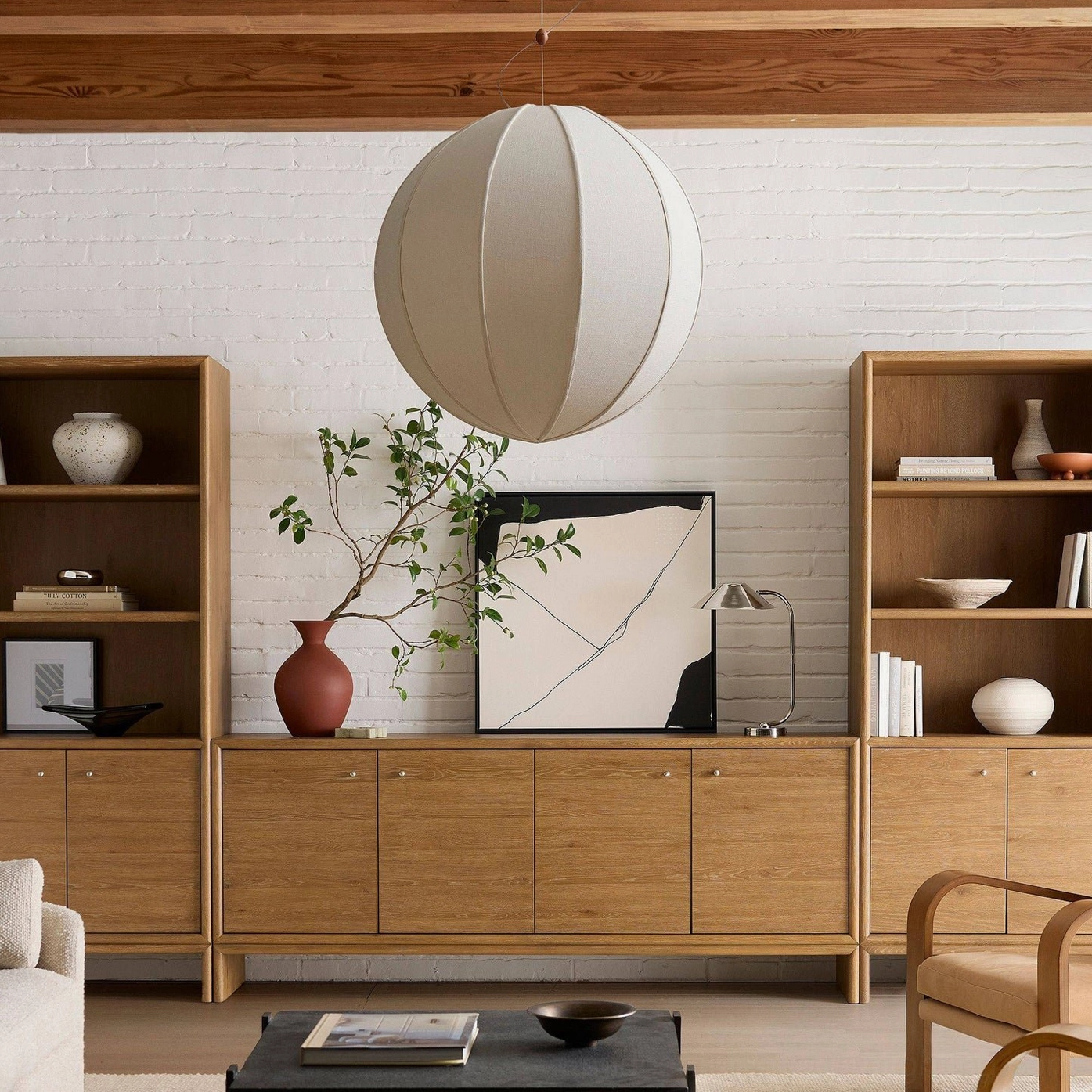 Off-white Yaratam pendant light with segmented shade design showing neutral minimalist aesthetic