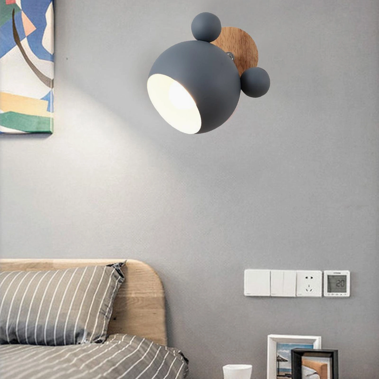 Yellow mouse wall lamp beside wooden furniture complementing Nordic modern interior