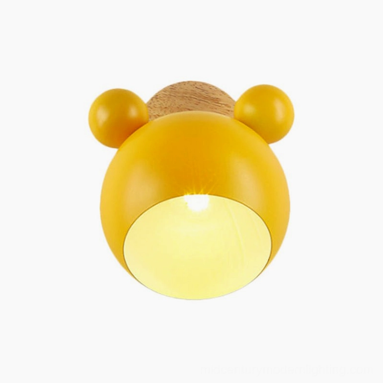 Yellow mouse lamp nursery play space cozy reading corner warm illumination