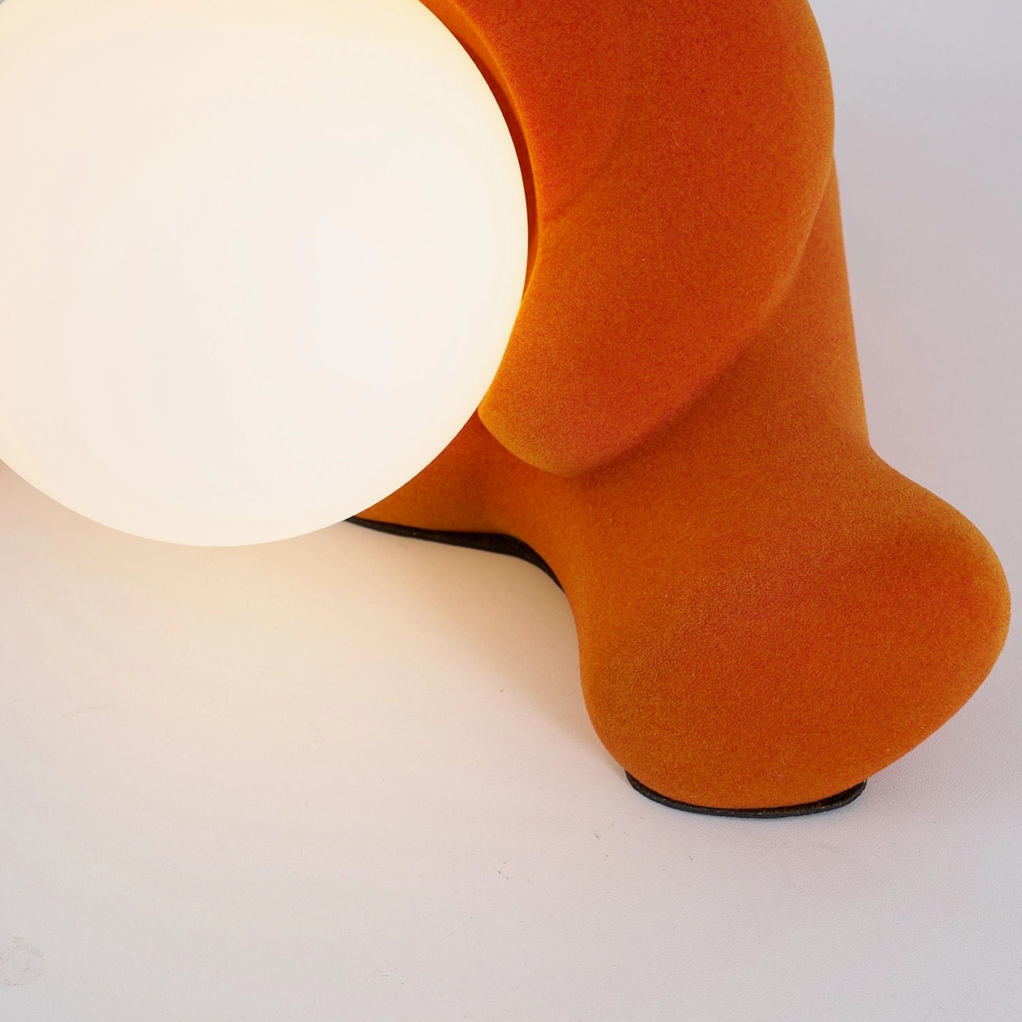 Yellow teddy bear table lamp styled with mid-century modern furniture