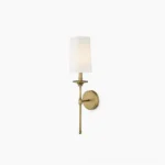 Antique brass mid-century modern wall sconce with white fabric shade, frontal product view