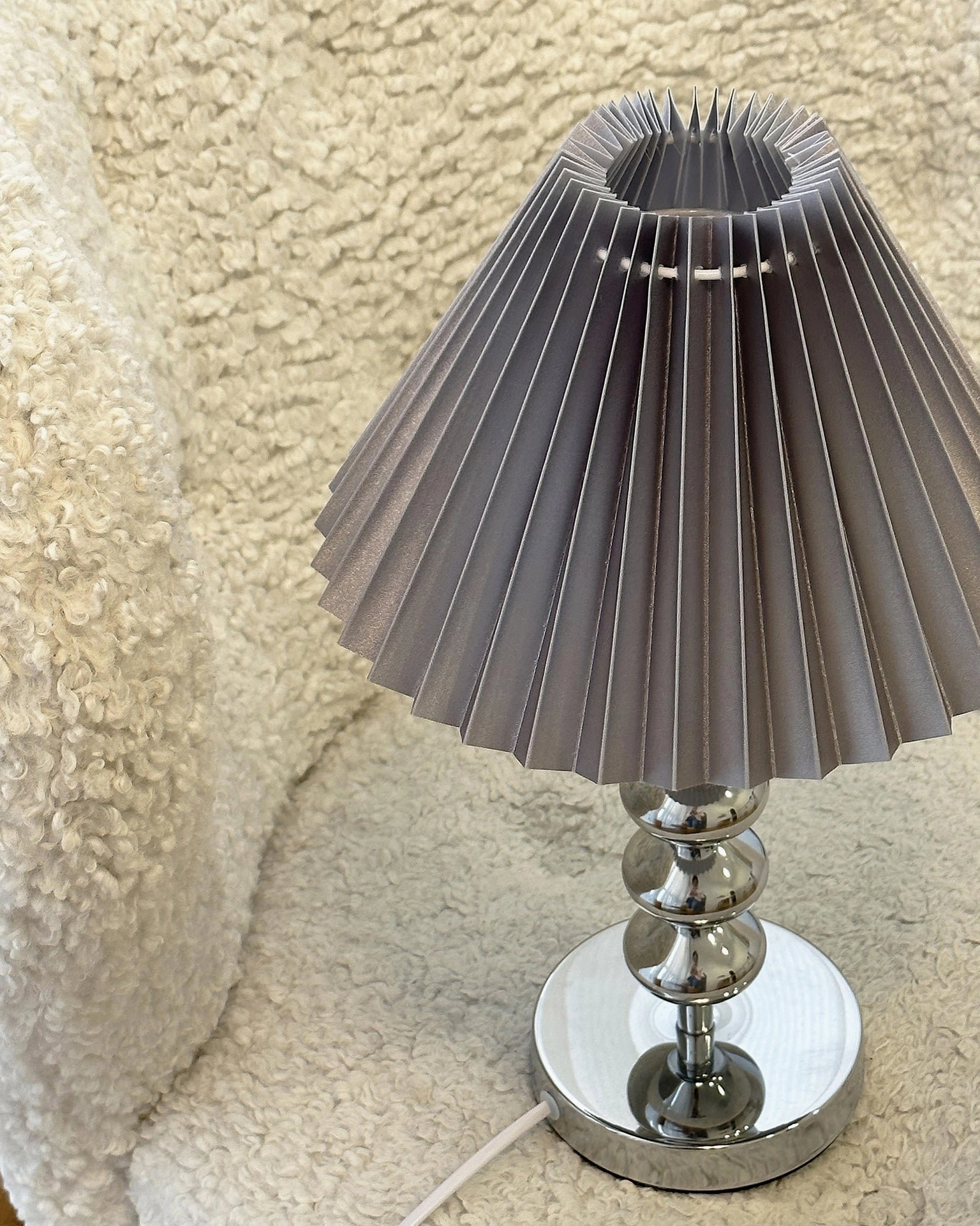 Zuma grey pleated table lamp soft neutral minimalist design close-up