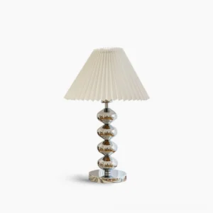 Zuma pleated table lamp white shade with polished chrome stacked base studio front view